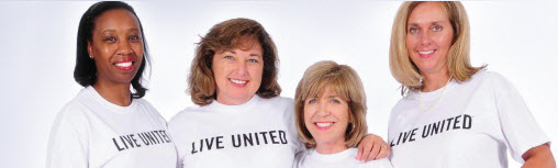 Women wearing Live United Tshirts